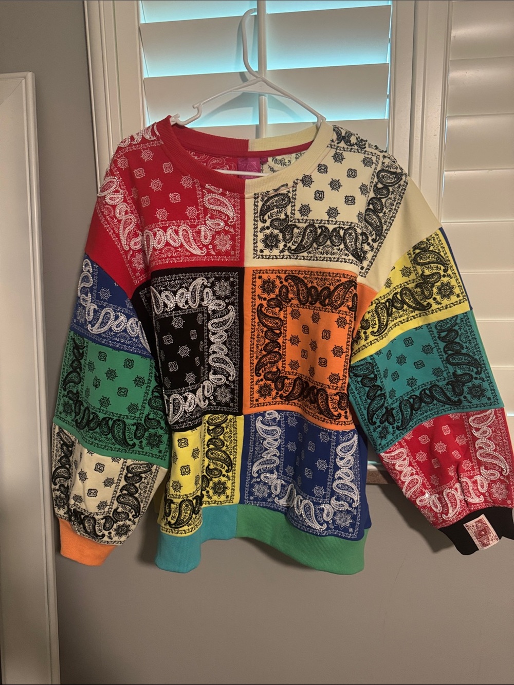 Queen of Sparkles colorblock bandana sweatshirt. Size XS NWOT